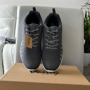 NWT Mens dark gray and white sneaker never worn.